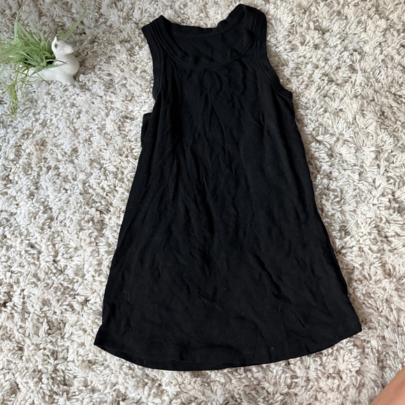 Tops - Black sleeveless Classic extra long women’s tank top Black Sleeveless Tank (Size